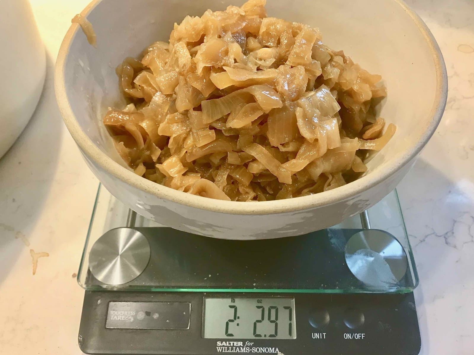 Caramelized onions on the scale -- weighing 2 pounds.