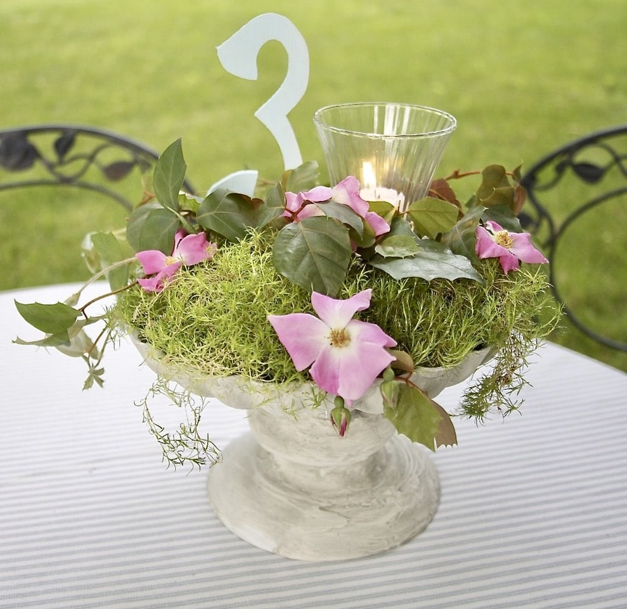 Faux concrete birdbath centerpiece with candle and table number
