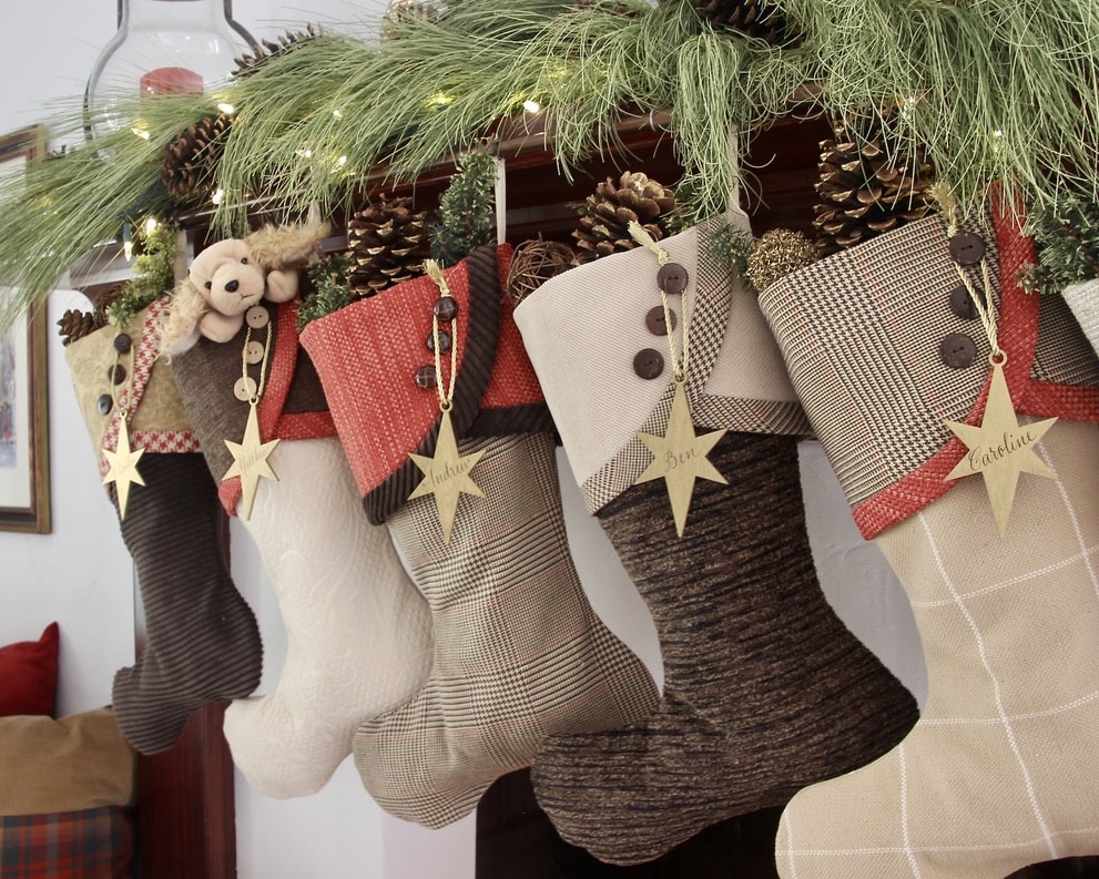 red and brown christmas stockings with gold star name tags