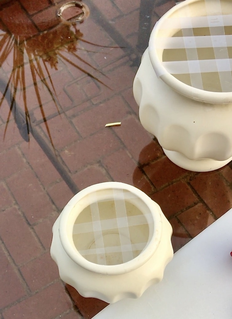 Two pots with tape grid for flower arranging