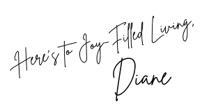 hand written signature that reads: Here's to Joy-filled Living, Diane