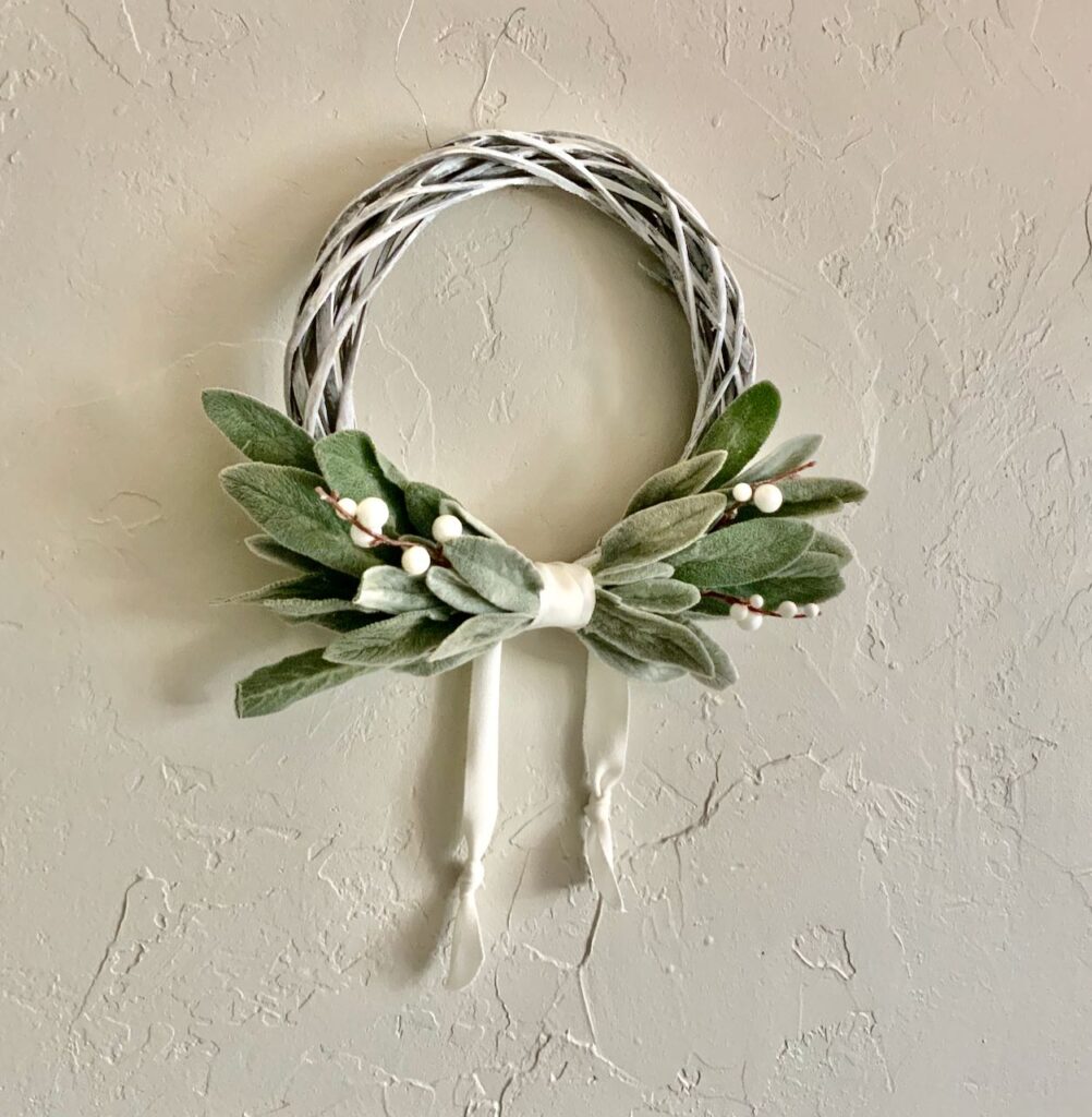 Finished Wreath Hanging on Plaster Wall
