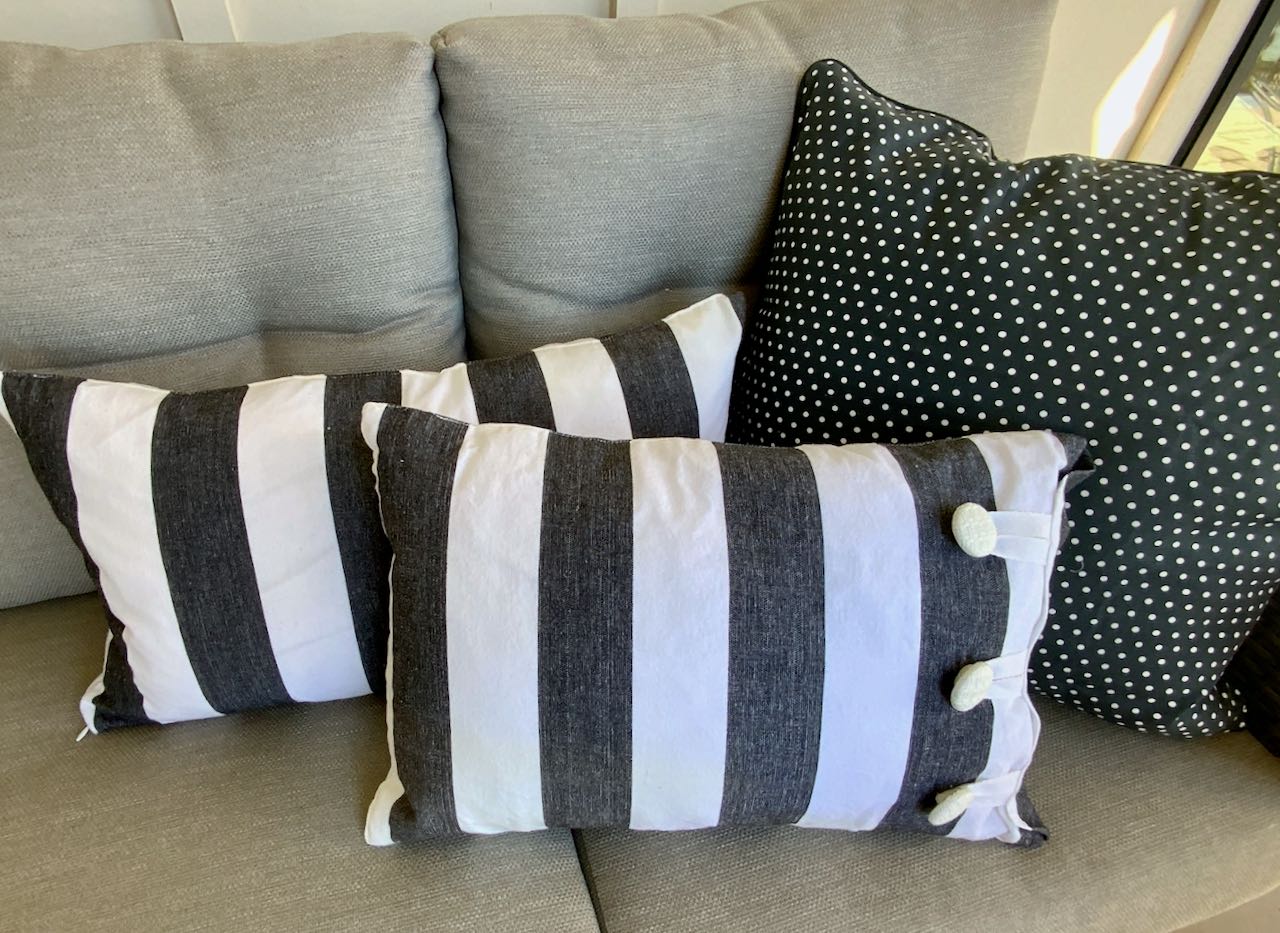 Both a Zipper Closed and a Button Closed Cabana Stripe pillow pictured with a coordinating dots square pillow