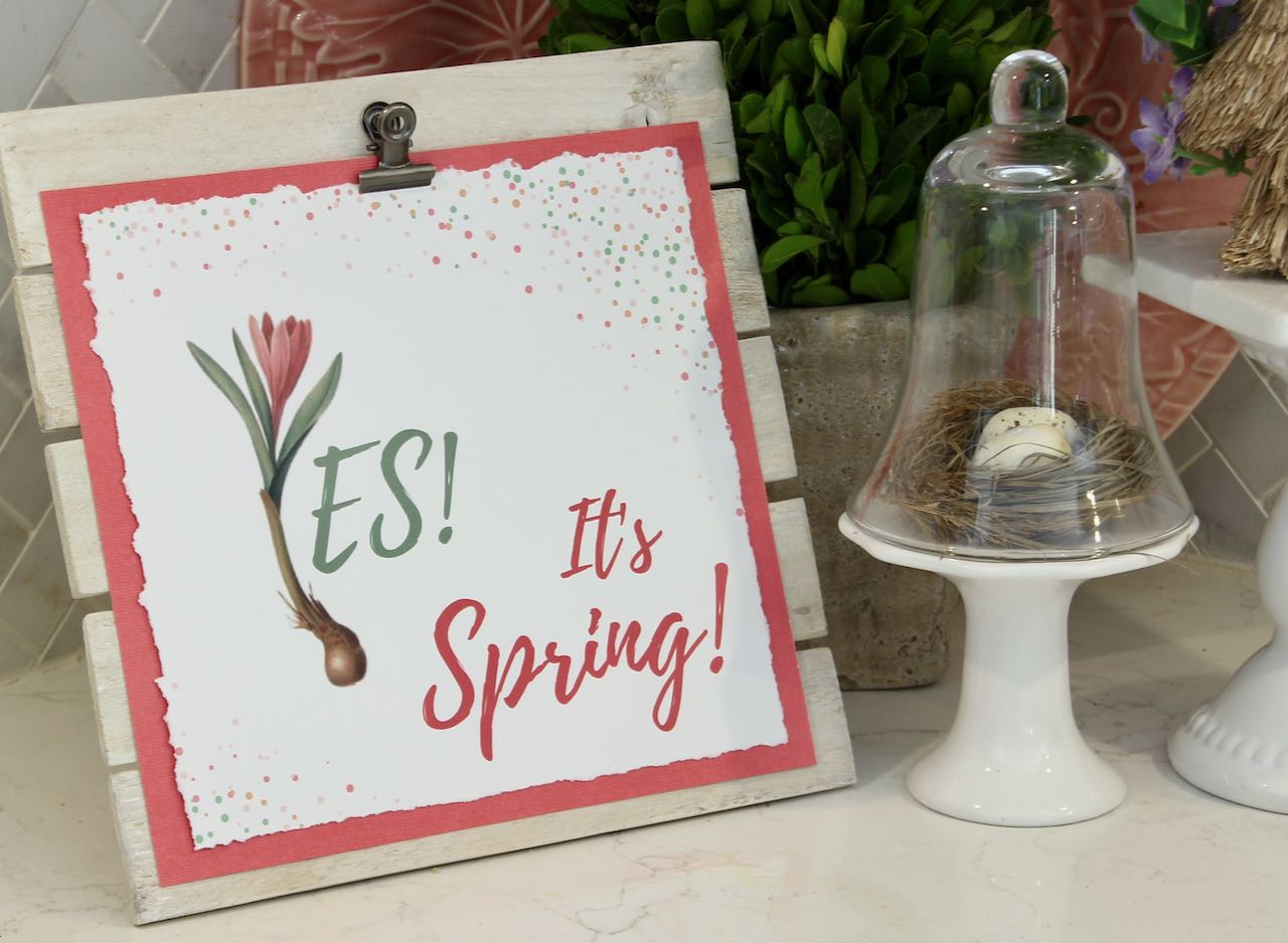 "Yes, It's Spring" graphic clipped on the white washed easel