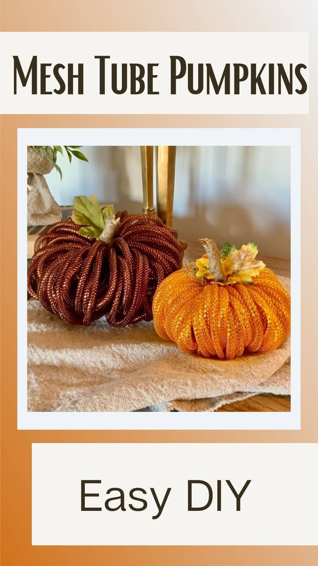 Pin with the image of two mesh tube pumpkins on a washed linen table runner with a Title above "Mesh Tube Pumpkins" and below "Easy DIY"