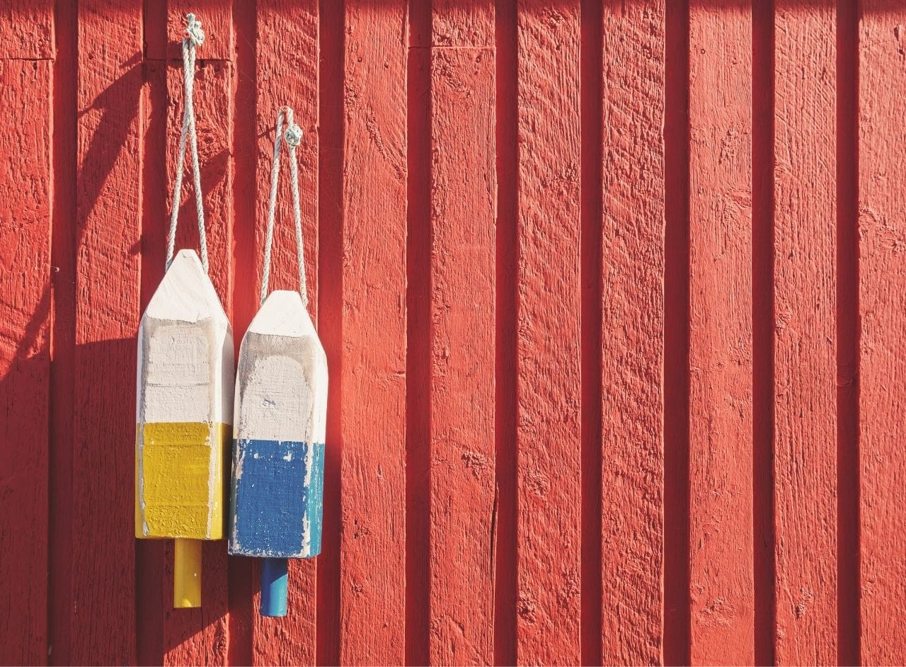 Wooden Holiday Buoys Add Coastal Christmas Decor - South House Designs