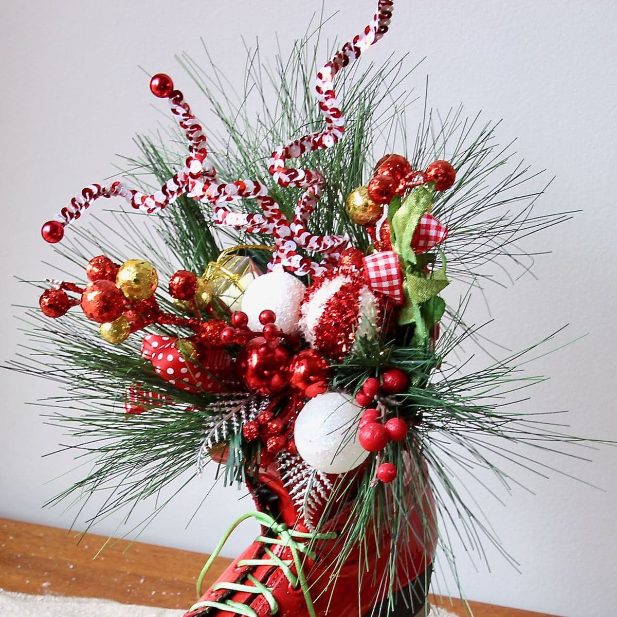 closeup of the greenery and accents spilling out of the top of the boot