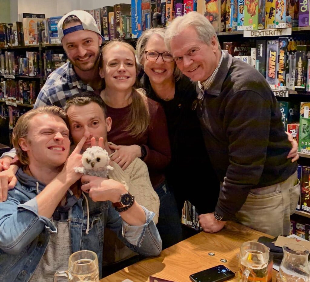 Family of six full of shenanigans at a game bar