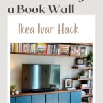 Pinterest Pin with picture of a set of wall cabinets with a TVon top and floating books shelves all around. Caption reads "How to Add Closed Storage to a Book Wall - Ikea Ivar Hack