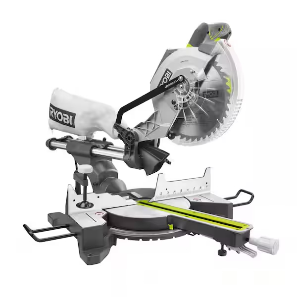 A Ryobi sliding compound miter saw with a clear blade guard, dust collection bag, adjustable fence, and a yellow measuring guide on the base—perfect for DIY projects like building shelves for a walk in pantry. The saw is positioned at an angle on a white background.