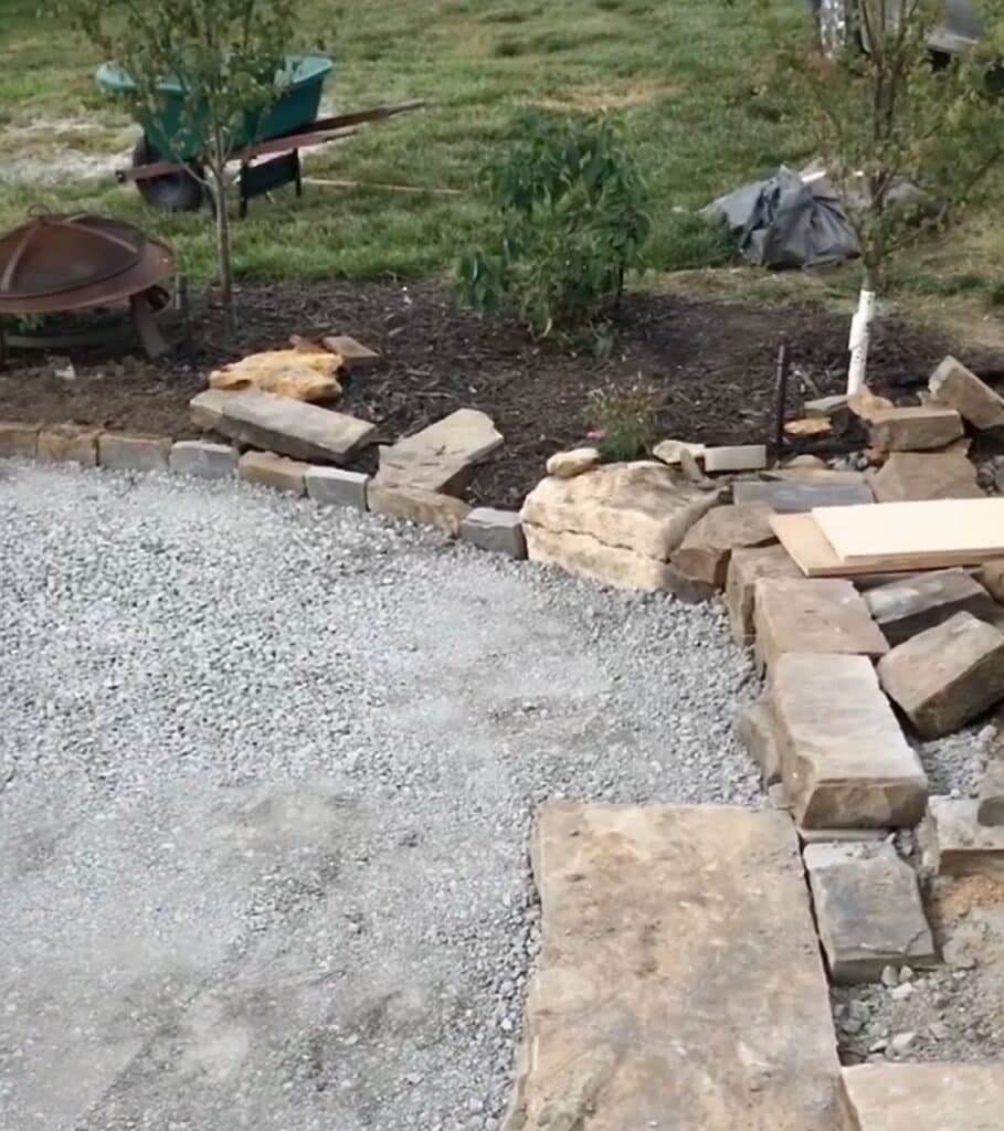 Image of another corner of the patio filled with road fill that has been compacted