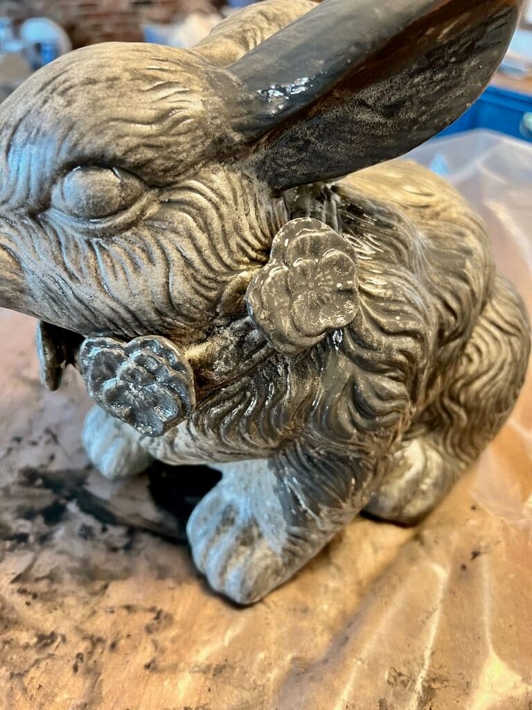 Closeup of Bunny Statue in the process of being madeover to a concrete rabbit statue