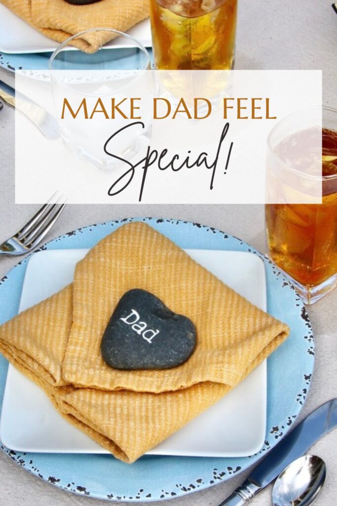 Pin Tower with a picture of a heart-shaped rock that says "Dad" sitting on the folded napkin at Dad's placesetting. The title reads: Make Dad Feel Special!