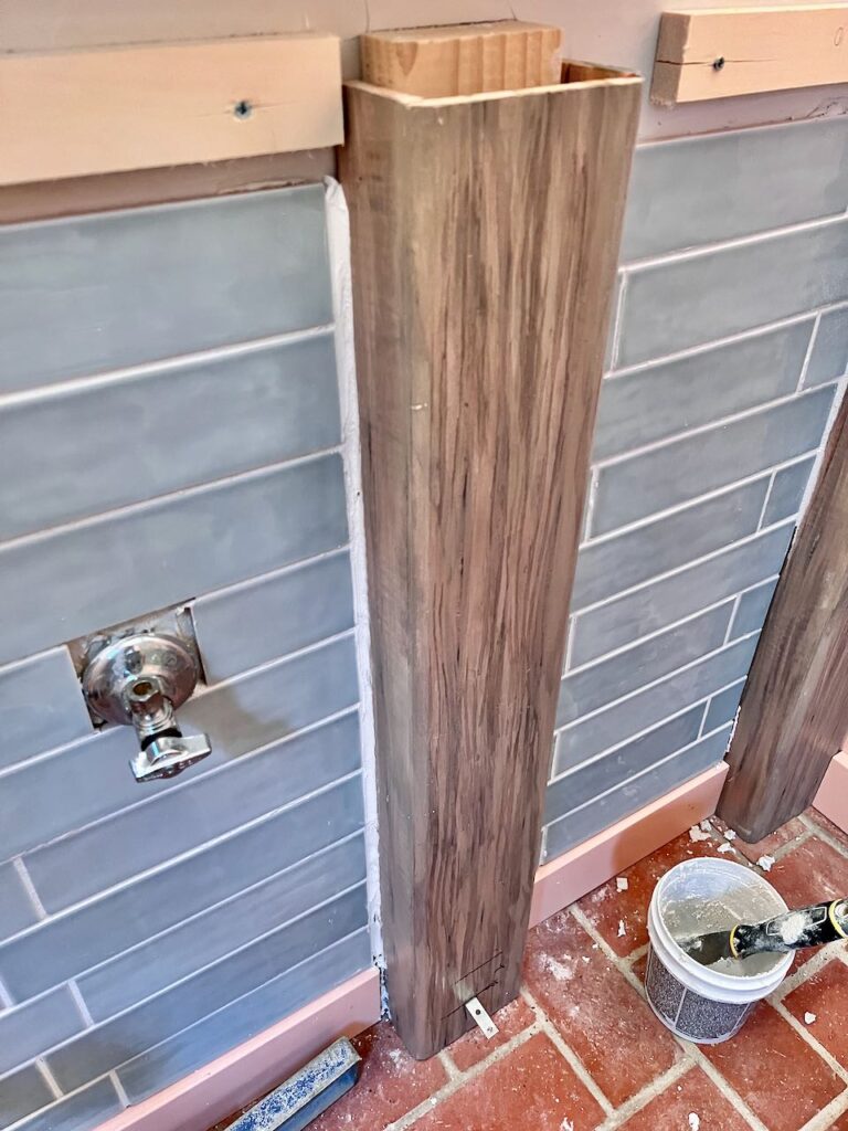 view of grout between tile and beam