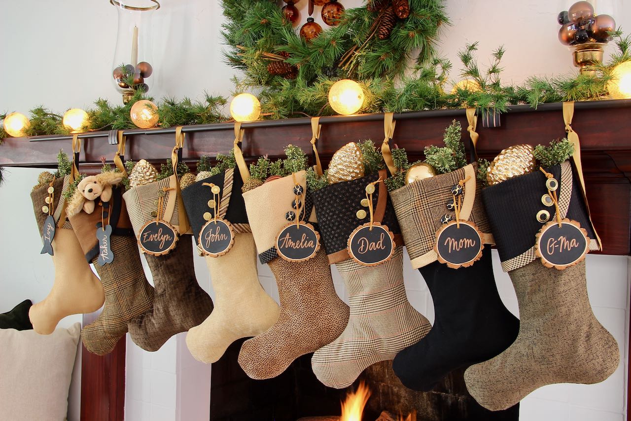 8 coordinating formal, dramatic Christmas stockings with gold star name tags