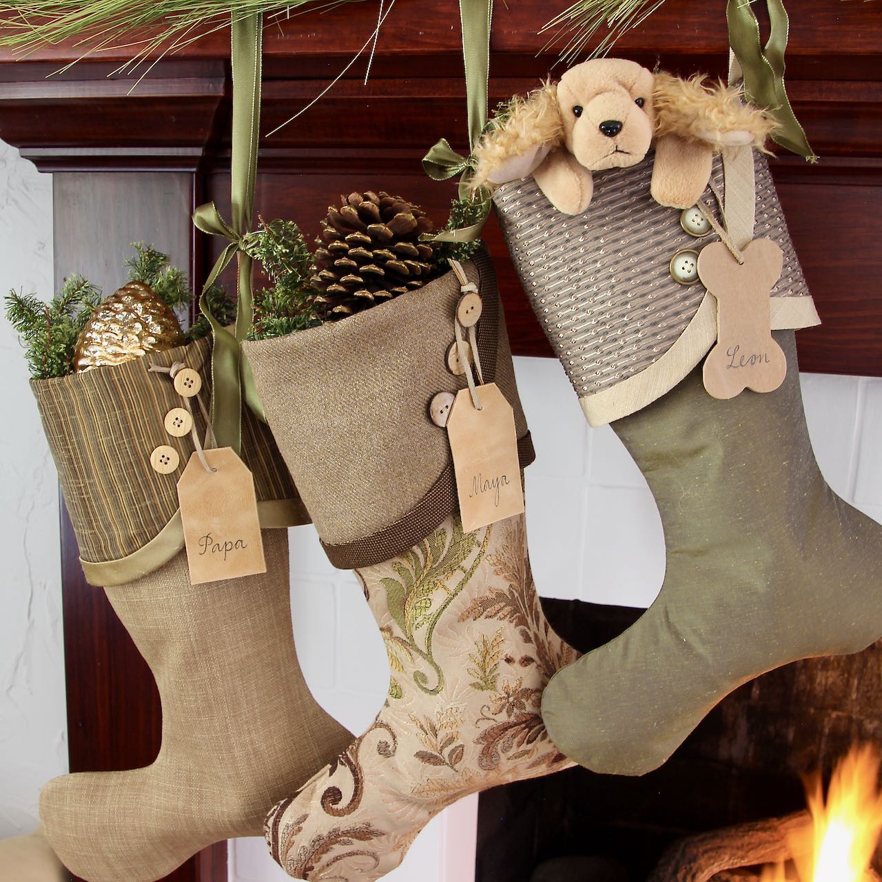 closeup of 3 woodland -inspired Christmas stockings