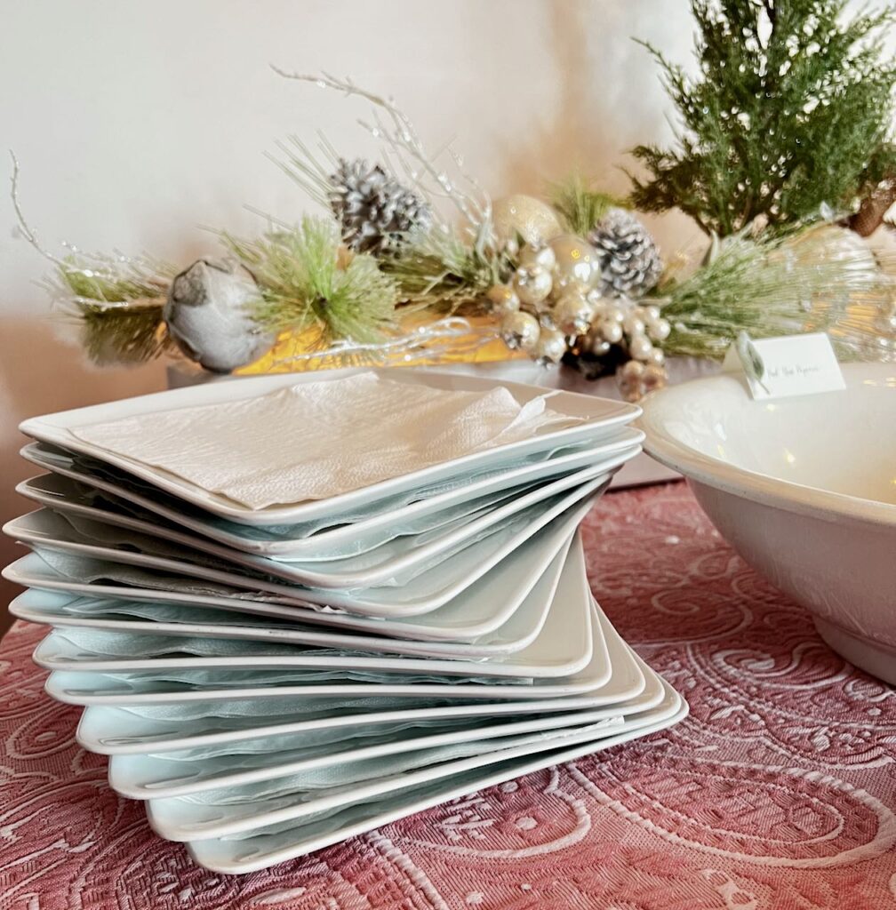 stack of square white plates swirled in a column