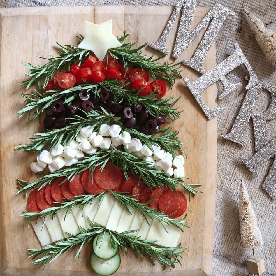 Christmas charcuterie board looking like a Christmas tree