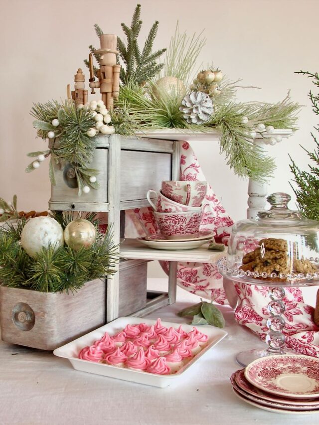 finished Christmas cookie display holding trays and plates of different Christmas cookies