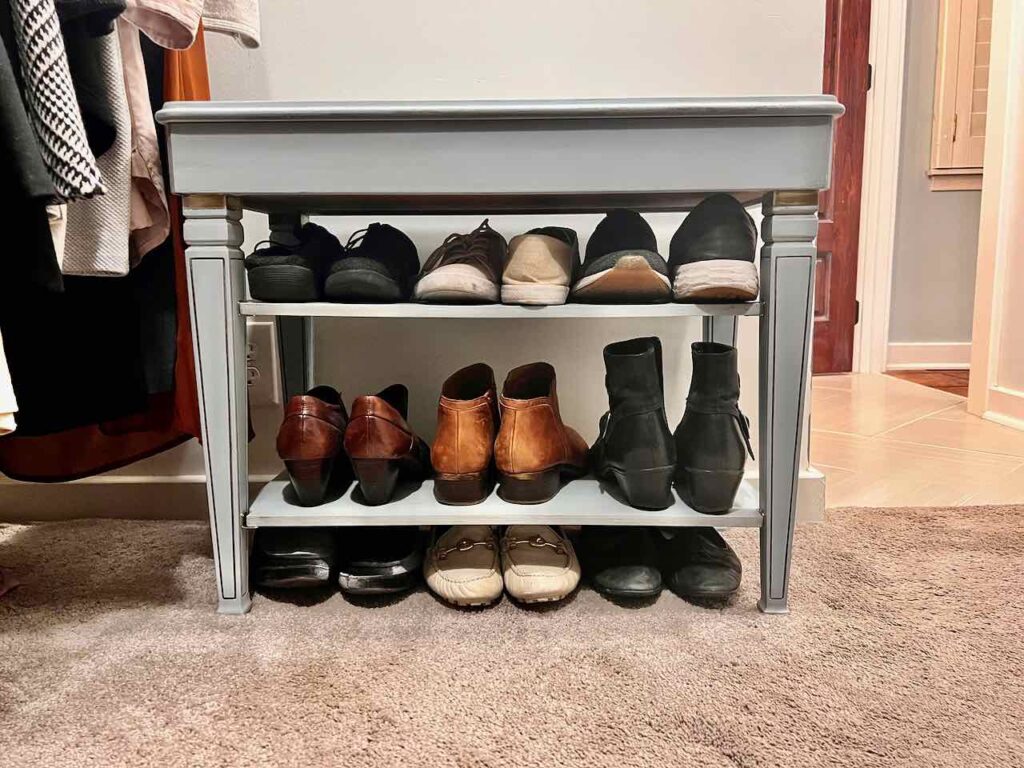 the finishhed shoe storage bench is finished, loaded with shoes (and sox) andat duty in our small closet