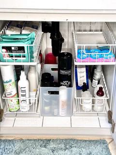 organizers under a bathroom sink