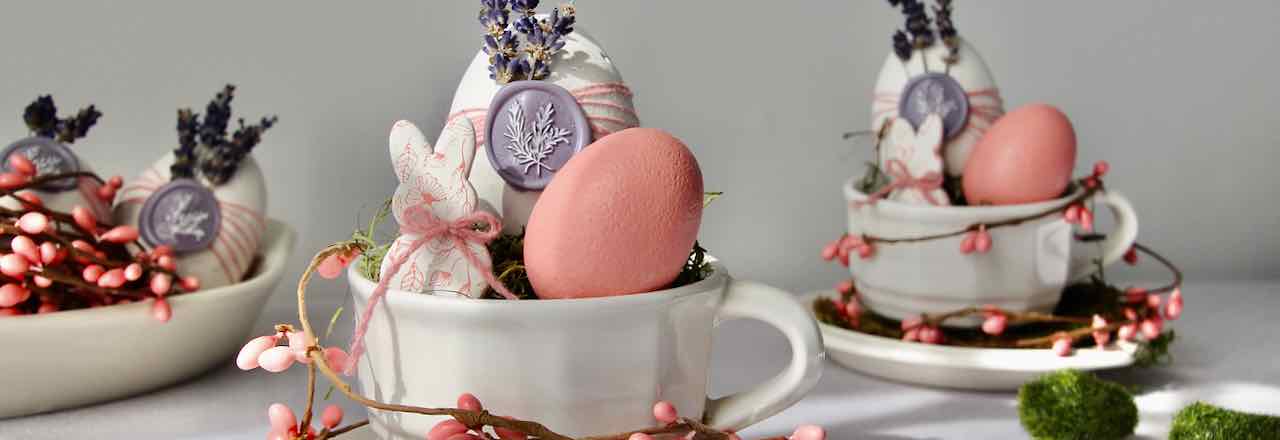 wide closeup of "concrete" eggs with lavender and wax seal embellishments