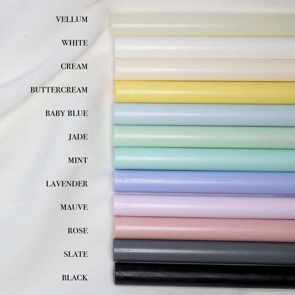 many colors of wax sticks are lined up