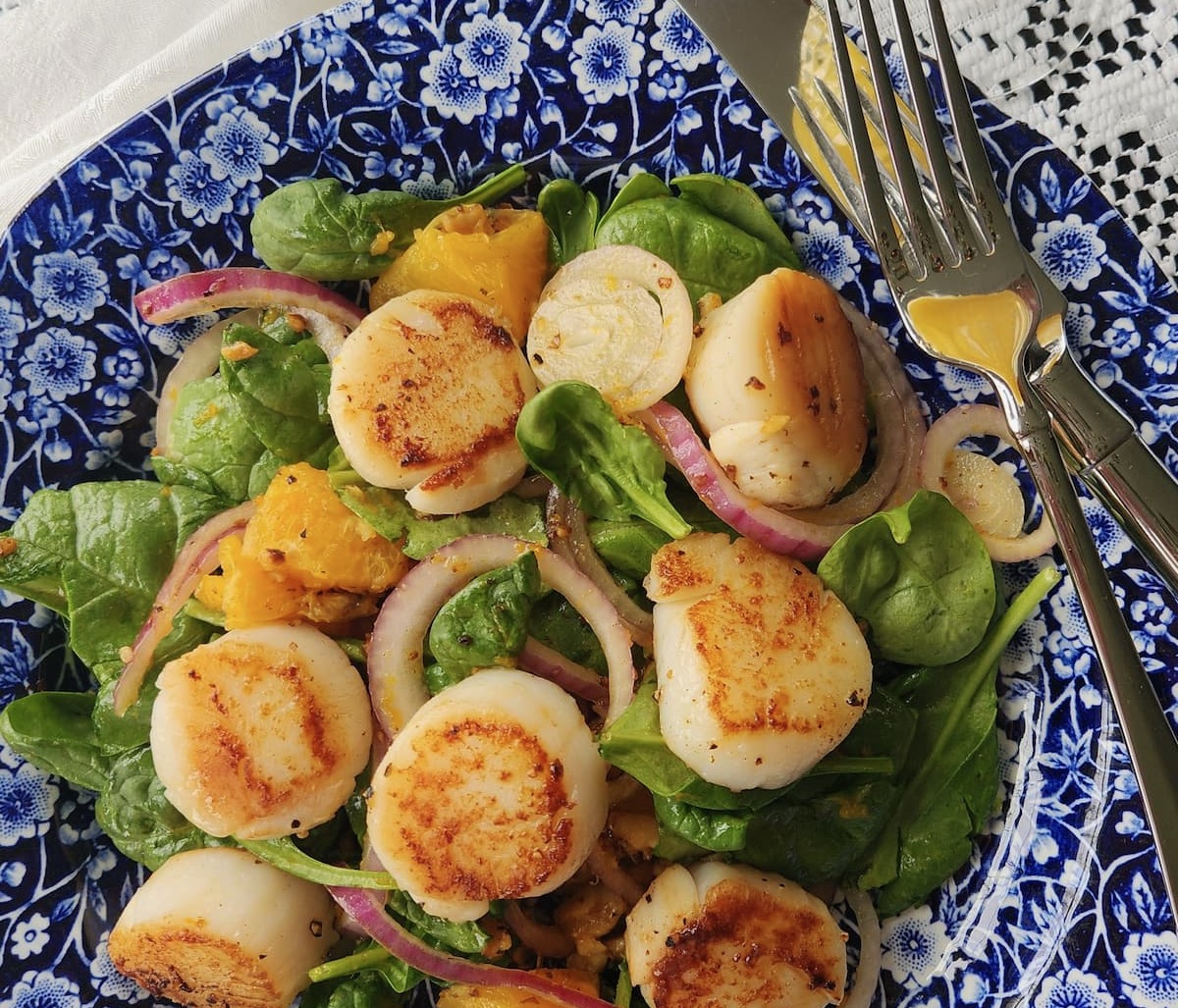 closeup of scallop salad on a plate