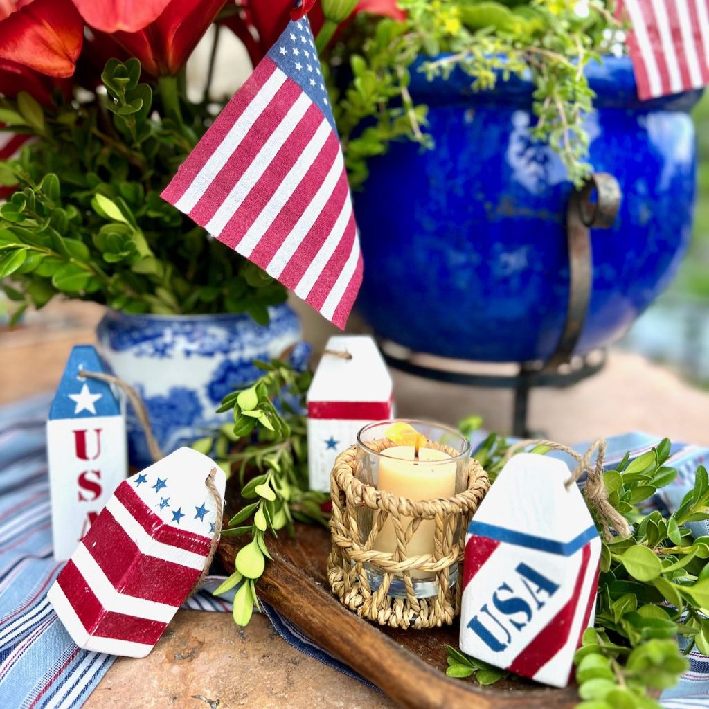 set of four wooden buoys with other items for 4th of July display