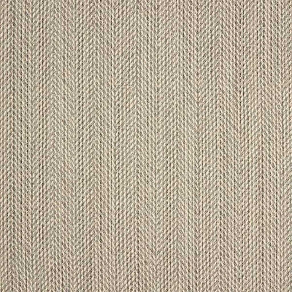 Close-up of a beige and light gray herringbone fabric pattern on an upholstered backrest and bench cushion, showing a repetitive V-shaped weave with fine, diagonal lines for a textured, subtle geometric appearance.