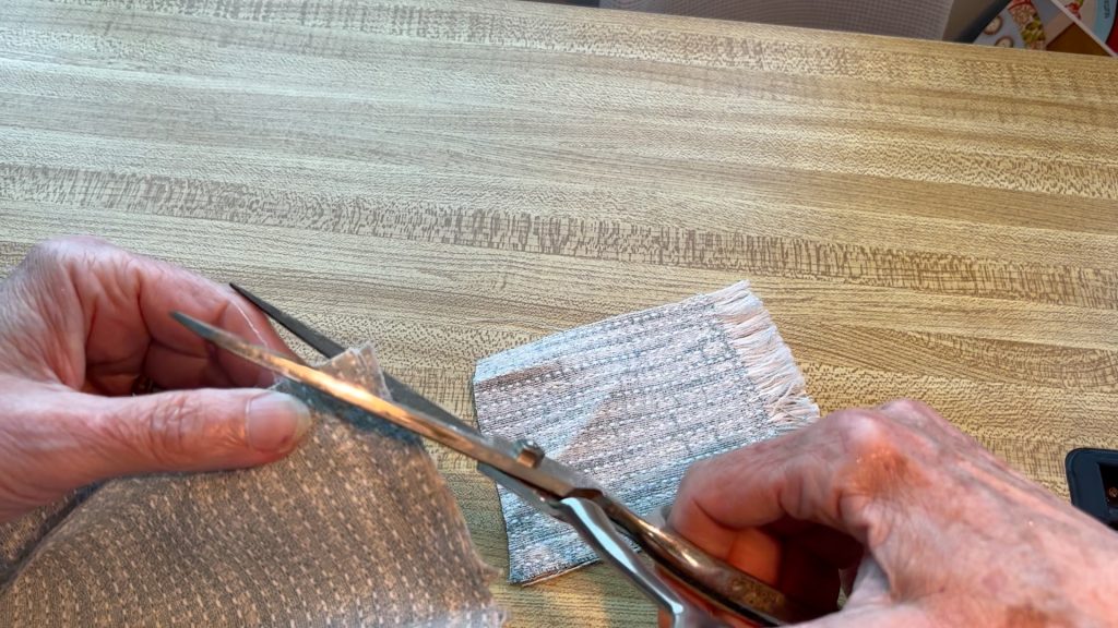 scissors clipping the corners off