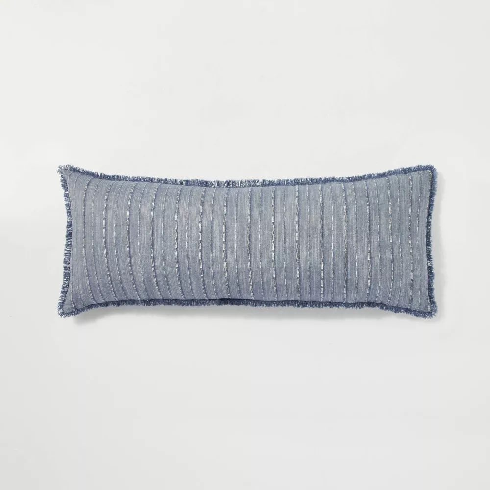 long lumbar pillow in an earthy textural fabric