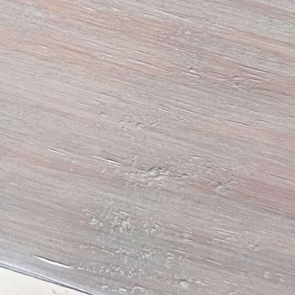 closeup of paint white washed finish on the shelf
