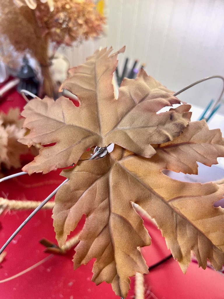 the first three leaves are placed on the large globe