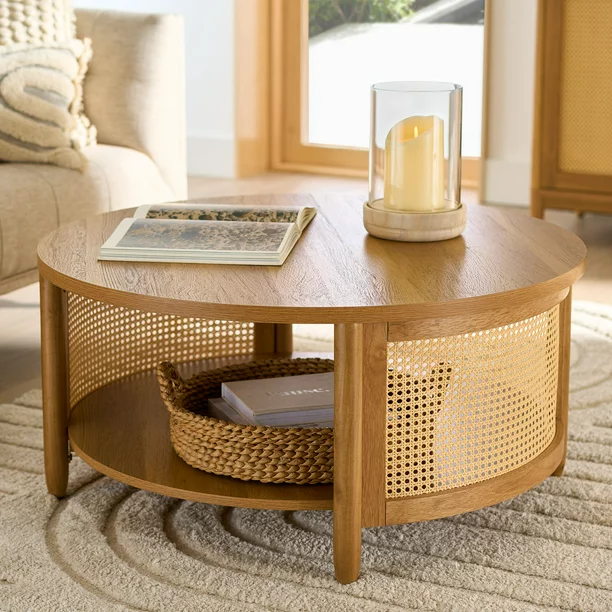 round coffee table with caning accents and a lower shelf