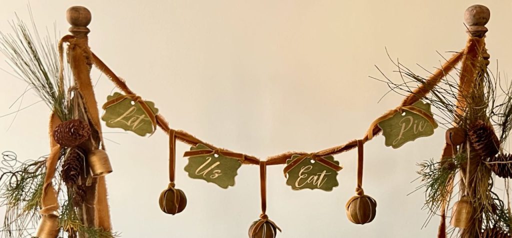 Pie party garland that says Let Us Eat Pie