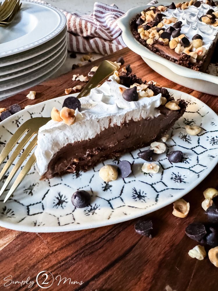 slice of chocolate hazelnut pie on a dessert plate with a fork