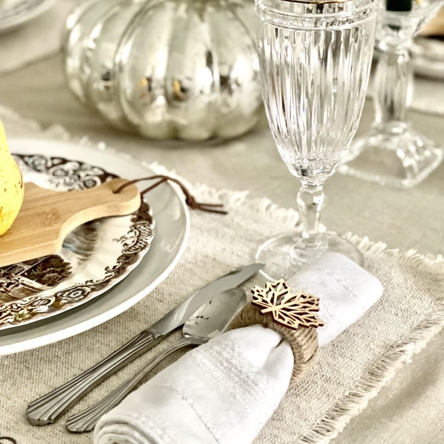 napkin rings made with twine and wood cut out leafs