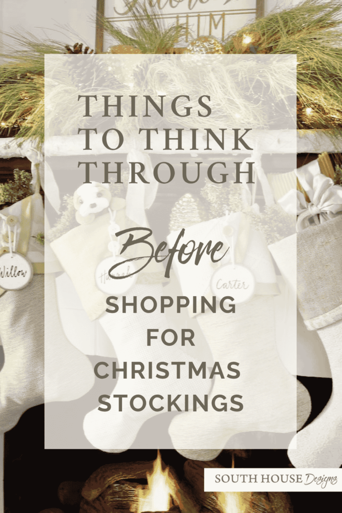 Text reads: "Things to think through before shopping for Christmas stockings." Four beige stockings hang on a decorated mantel with greenery, ornaments, bows, and personalized name tags. A fire burns below.